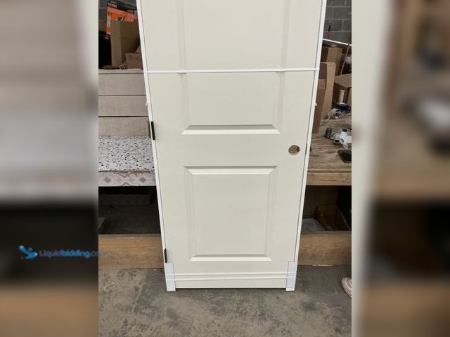 Lot 49-5450668 - Beige Door. 80'' x 30''. New. Scuffs and scratches present.