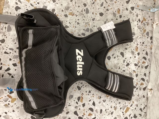 Lot 49-3523637 - Zeus Weighted Vest. Item is Unused
