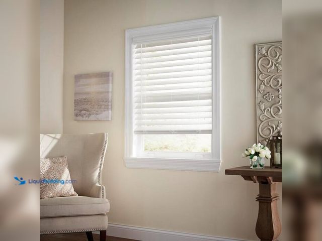 Lot 49-2024779 - Home Decorators Collection White Cordless Room Darkening Premium Faux Wood Blind w/2.5in. Slats - 72...