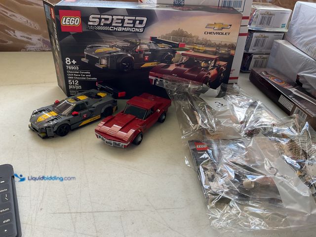Lot 49-3503978 - PRE-OWNED COMPLETE OPEN BOX LEGO SPEED CHAMPIONS CHEVROLET CORVETTE C8.R RACE CAR AND 1969 CHEVROLET...