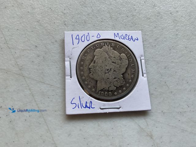 Lot 49-1804649 - 1900-O MORGAN ONE DOLLAR COIN.