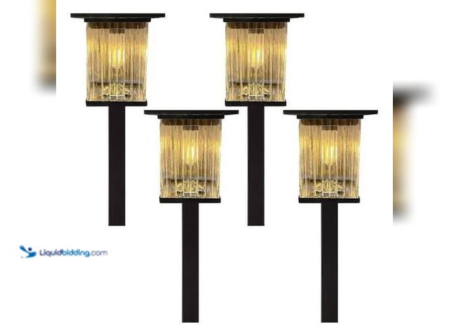 Lot 49-1629215 - Monteaux Lighting Black Integrated LED Outdoor Solar Pathway Lights with Clear Ribbed Glass (4-Pack)...
