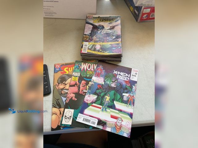 Lot 49-5341553 - LOT OF 20 COLLECTIBLE COMIC BOOKS FROM DC, MARVEL AND MORE INCLUDING X-MEN, WOLVERINE, SUPERMAN AND ...