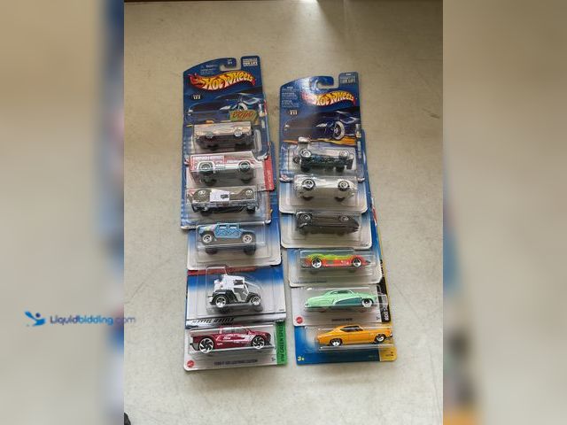 Lot 49-3609277 - Other LOT OF 12 HOT WHEELS 1/64 SCALE DIECAST CARS SEALED VARIOUS MAKES AND MODELS