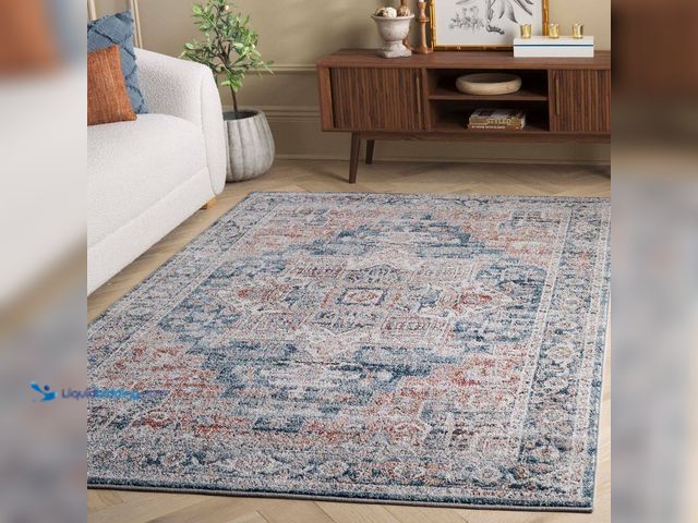Lot 49-5437787 - SAFAVIEH Vintage Tabriz 9 ft. x 12 ft. Blue/Rust Distressed Aztec Medallion Area Rug. [Model # VTA20...