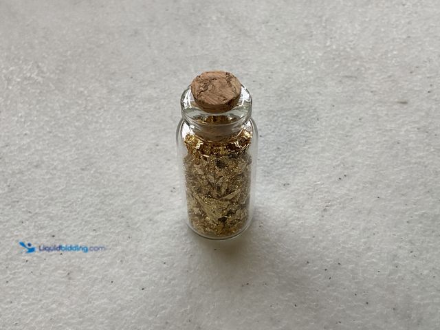 Lot 49-5314796 - RARE ONE INCH GLASS VILE OF PURE 24K GOLD FLAKES