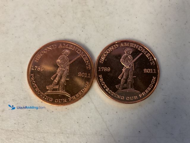 Lot 49-5467316 - LOT OF 2 COLLECTIBLE FACE ONE AV OUNCE .999 FINE COPPER COINS