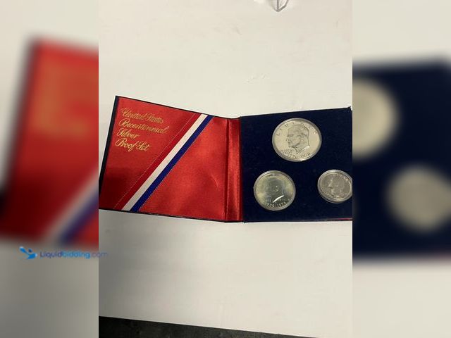 Lot 49-910558 - Official 1976 United States Bicentennial Silver Proof Set featuring the 40% silver Eisenhower Dollar...