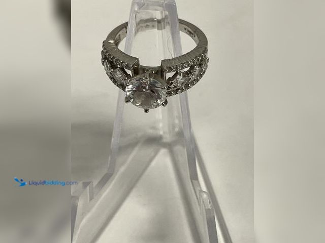 Lot 49-910577 - Sterling Silver Size 4 Ring with Round Solitaire & Multi-Stone Band featuring a brilliant round clea...
