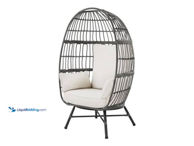 Lot 49-5554387 - Hampton Bay Breezy Bay Gray Wicker Outdoor Egg Chair with CushionGuard Almond Cushions. Model # FRS5...
