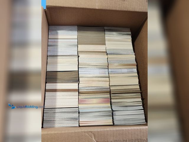 Lot 49-1817790 - BOX OF AROUND 2,000 COLLECTIBLE SPORTS CARDS. VARIOUS SPORTS BRANDS AND YEARS PRODUCED. NOTICED MANY...