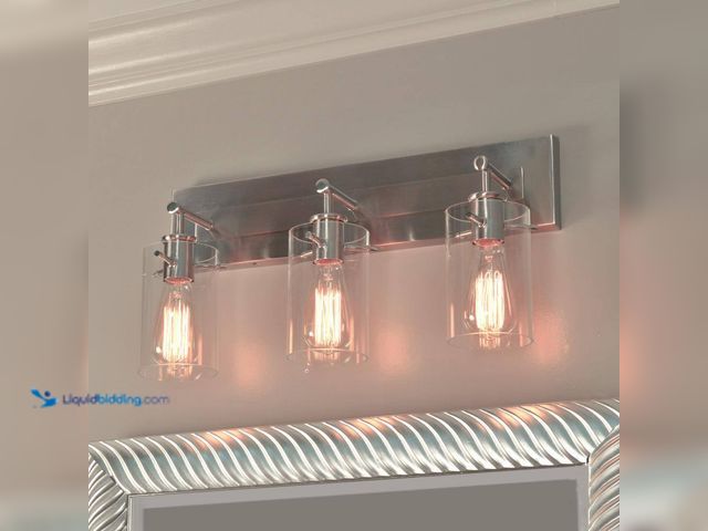 Lot 49-3564036 - Regan 21 in. 3-Light Brushed Nickel Bathroom Vanity Light with Clear Glass Shades (unable to test) U...