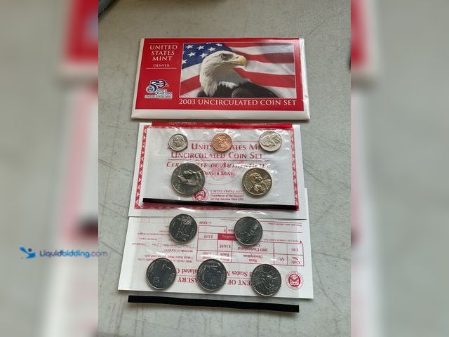 Lot 49-2009033 - 2003 UNITED STATES MINT UNCIRCULATED COIN SET 10 COINS IN PLASTIC SLEEVES AND ORIGINAL ENVELOPE