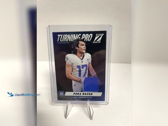 Lot 49-910516 - 2023 Panini Zenith Turning Pro Memorabilia Puka Nacua Rookie Patch Card – Los Angeles Rams Featuring...