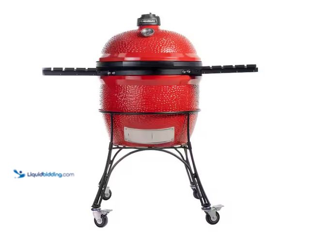 Lot 49-1551397 - Kamado Joe Big Joe I 24 in. Charcoal Grill in Red with Cart, Side Shelves, Grate Gripper, and Ash To...