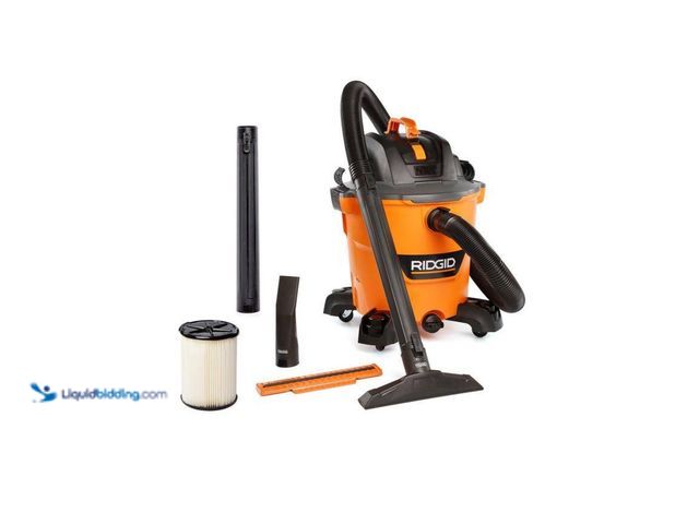 Lot 49-1637963 - 12 Gal. 5.0 Peak HP NXT Shop Vacuum Wet Dry Vac HD1200B, Slightly used, Has attachments. Powers on. ...
