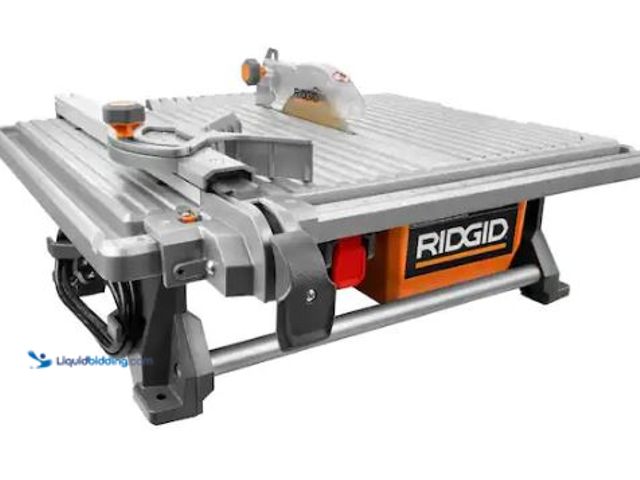 Lot 49-3473117 - RIDGID 6.5-Amp 7 in. Blade Corded Table Top Wet Tile Saw, Model # R4021, Slightly used.  Ref#SB1029