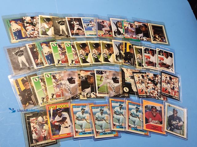 Lot 49-1817764 - 43- COLLECTIBLE FRANK THOMAS MLB BASEBALL CARDS. VARIOUS BRANDS AND YEARS PRODUCED. INCLUDES 7 ROOKI...