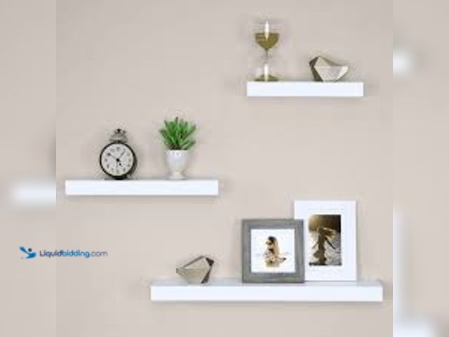 Lot 49-5436586 - Set of 3 24"long white floating shelves. Slightly used.