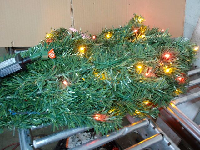 Lot 49-1546887 - Funcid LED Pre-Lit Artificial Christmas Tree, Green, Slightly used, Tested works, Powers on.   Ref#H...