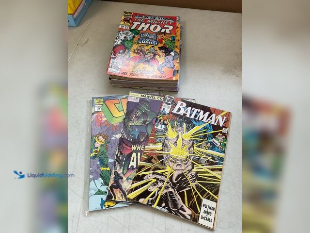 Lot 49-3503983 - LOT OF 20 COLLECTIBLE COMIC BOOJS FROM DC, MARVEL AND MORE INCLUDING BATMAN, AVENGERS, CABLE, THOR A...