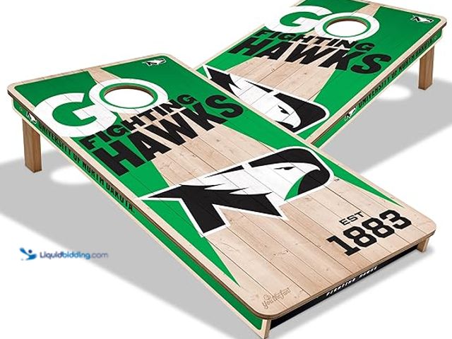 Lot 49-5411707 - YouTheFan NCAA 2’ x 4’ North Dakota Fighting Hawk Professional Wood Cornhole Game. Model: B0DF31NNZP...