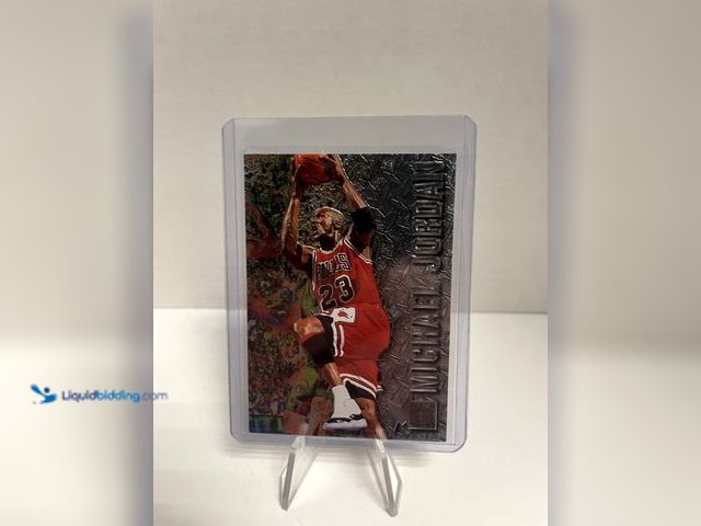 Lot 49-910514 - 1995-96 Fleer Metal Michael Jordan Insert Card – Chicago Bulls** Featuring Michael Jordan soaring to...