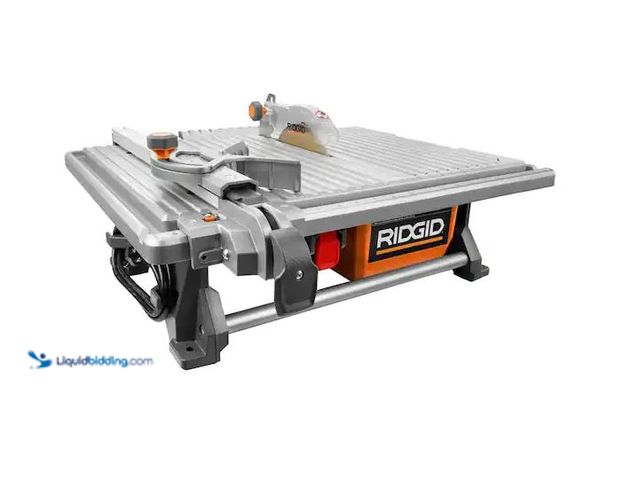 Lot 49-1576714 - RIDGID 6.5-Amp 7 in. Blade Corded Table Top Wet Tile Saw Model # R4021, Used, Has Attachments, Unabl...