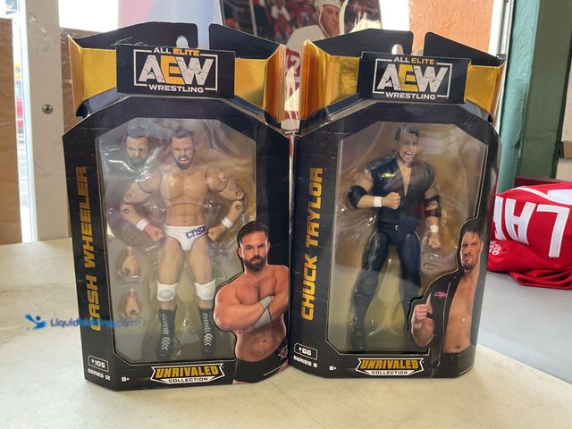 Lot 49-1505564 - COLLECTIBLE 2 AEW UNRIVALED ACTION FIGURES IN ORIGINAL BOXES INCLUDING CASH WHEELER AND CHUCK TAYLOR...