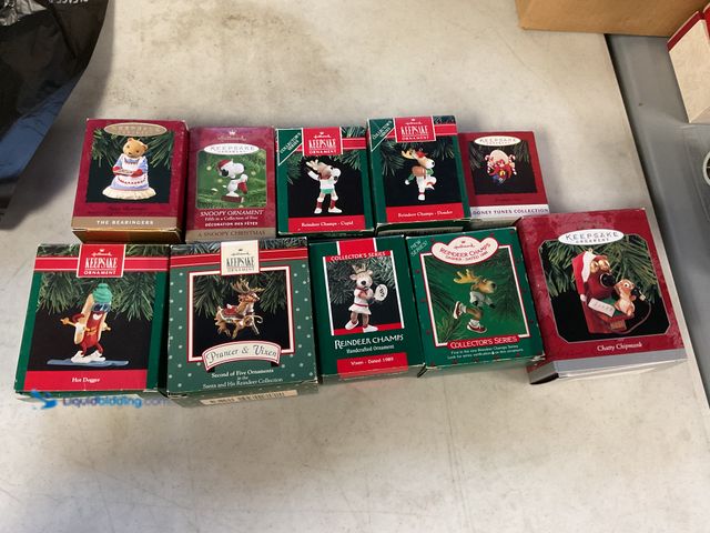 Lot 49-1505296 - COLLECTIBLE LOT OF 10 VINTAGE HALLMARK KEEPSAKE ORNAMENTS IN ORIGINAL BOXES INCLUDING HOT DOGGER, SN...