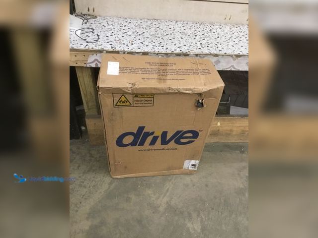 Lot 49-5416549 - Drive Medical TR37E-SV Lightweight Folding Transport Wheelchair with Swing-Away Footrest, Silver. Un...