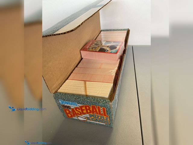 Lot 49-1909221 - 1990 DONRUSS BASEBALL COMPLETE 660 CARD SET STILL IN FACTORY BRICKS! GREAT SET! INCLUDING NOLAN RYAN...