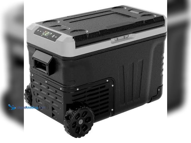 Lot 49-5541546 - Back portable cooler. Cord included. Unused, tested works power on.