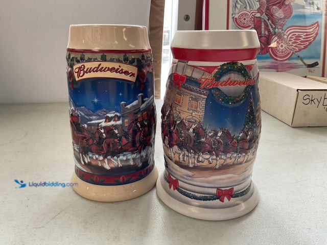 Lot 49-1505030 - COLLECTIBLE LOT OF 2 ANHEUSER-BUSCH BUDWEISER BEER STEIN MUGS CLYDESDALES HOLIDAY NO BOXES