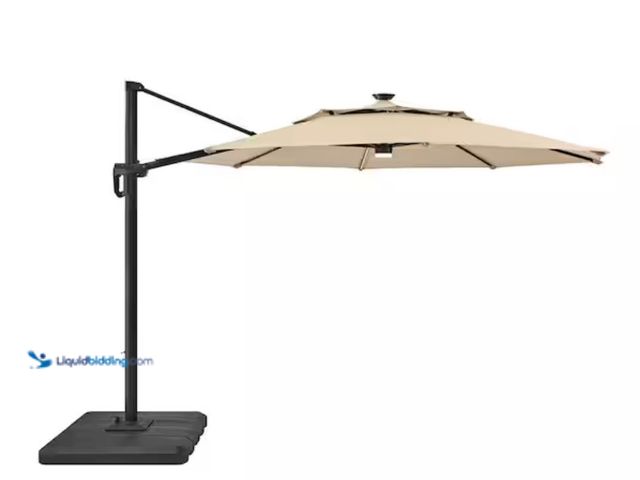 Lot 49-1631372 - Hampton Bay 11 ft. Aluminum Cantilever Solar LED Offset Patio Umbrella in Putty Beige, Model # URM82...