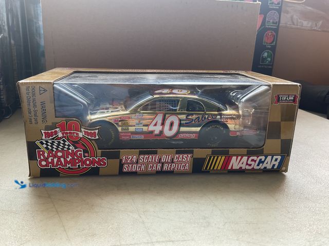 Lot 49-1977460 - Other RACING CHAMPIONS 1/24 SCALE DIECAST CAR IN BOX #40 STERLING MARLIN TEAM SABCO 1 OF 4,999