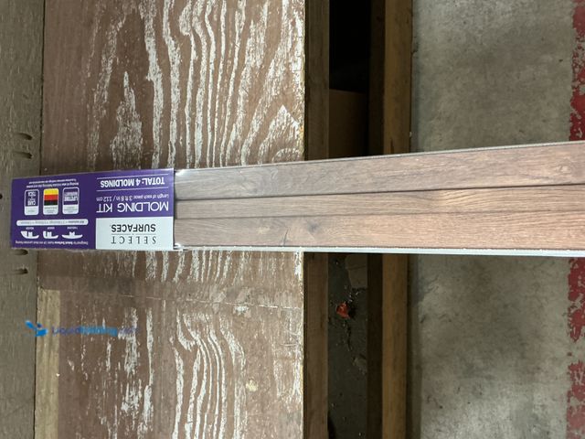 Lot 49-5544127 - QTY 3 - Select Surfaces Molding Kit 3'8" L. Kit includes: 2 T-Moldings, 1 End Cap, 1 Reducer.  4 Mol...