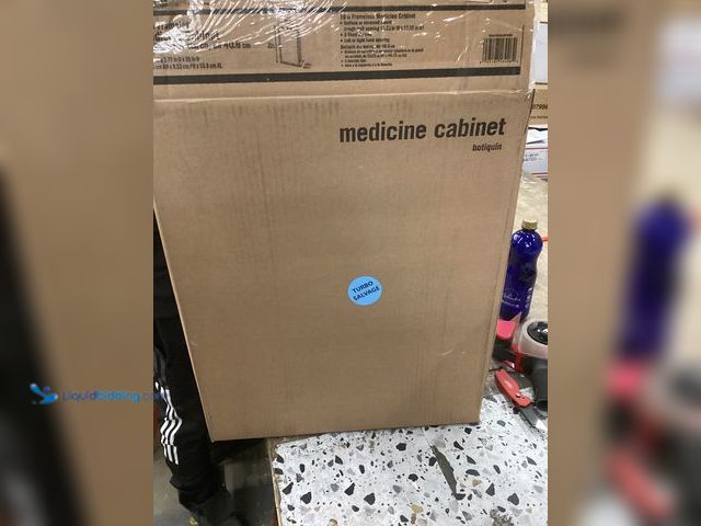 Lot 49-5486392 - 16 in Frameless Medicine Cabinet Item is used with small chip in corner