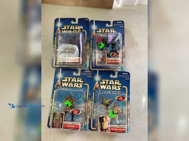 Lot 49-1810385 - COLLECTIBLE 4 STAR WARS ACTION FIGURES IN ORIGINAL PACKAGES, KIT FISTO, OBI-WAN KENOBI, GEONOSIAN WA...