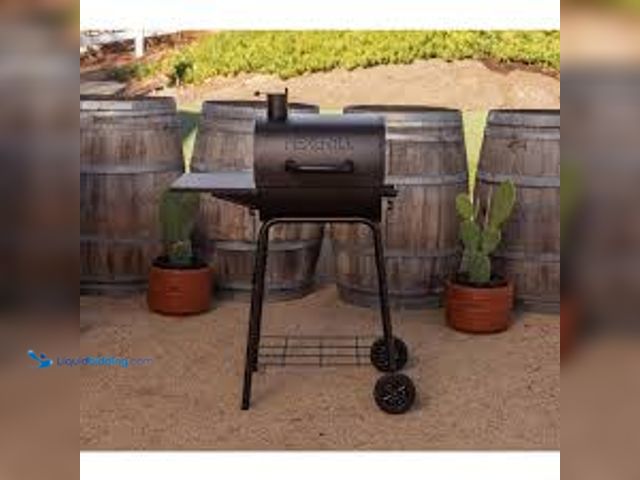 Lot 49-5488364 - Nexgrill 17.5 in. Barrel Charcoal Grill in Black. Model # 810-0063. Unused