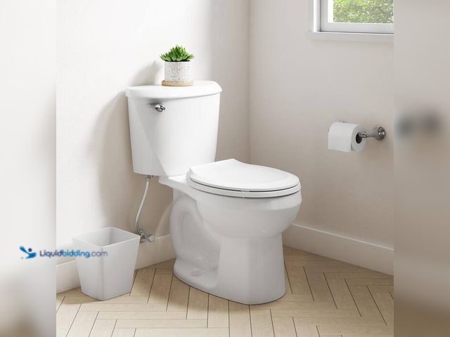 Lot 49-2004265 - American Standard Reliant 12 in. Rough In 2-Piece 1.28 GPF Single Flush Round Toilet with Slow Close...