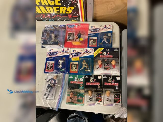 Lot 49-1505409 - COLLECTIBLE LOT OF 10 STARTING LINEUP AND HEADLINERS ACTION SPORT FIGURES ALL BUT ONE IN ORIGINAL PA...