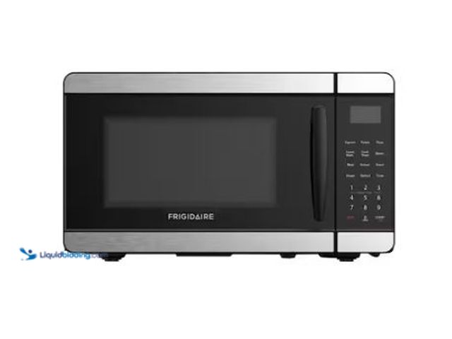 Lot 49-1558984 - Frigidaire 0.7 cu. ft. Countertop Microwave in Stainless Steel, Model # EMW729, Unused, Tested works...