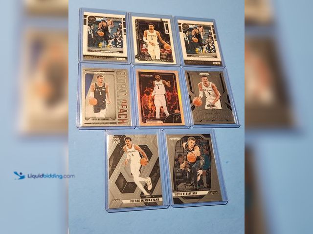 Lot 49-1817778 - 8- COLLECTIBLE VICTOR WEMBANYAMA NBA BASKETBALL CARDS. VARIOUS BRANDS AND YEARS PRODUCED. NBA SUPERS...