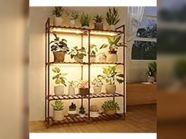Lot 49-3565704 - Bamboo World Plant Stand. Used