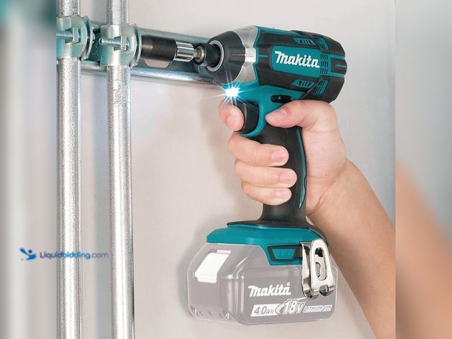 Lot 49-5414645 - Makita XDT11Z 18V LXT Lithium-Ion Cordless Impact Driver, Tool Only  [Model: 01AD0ZZME] used tested ...