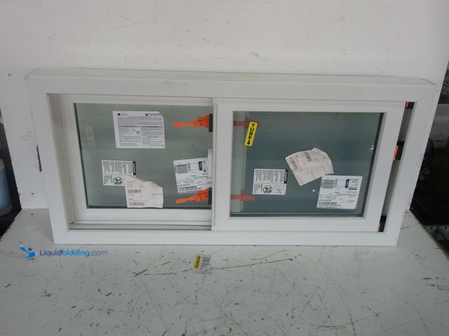 Lot 49-1625243 - Anderson double hung window 15 43/64" x 13 2/64", Model # SCH 8856, Unused. (NOTE: Crack on corner o...
