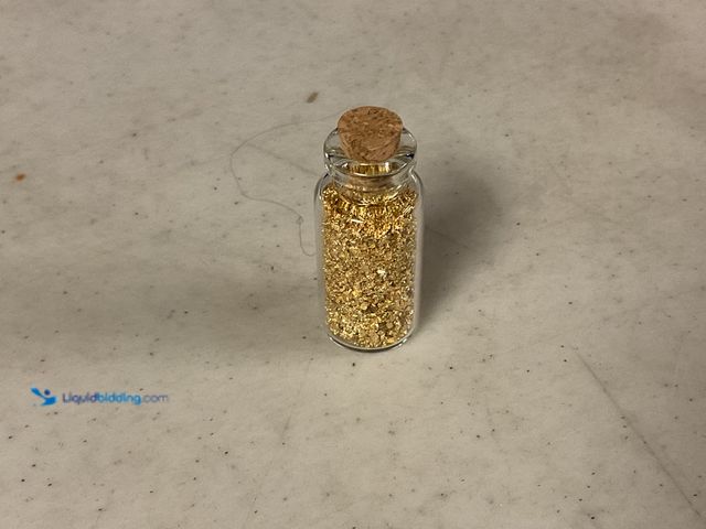 Lot 49-1830705 - RARE ONE INCH GLASS VILE OF PURE 24K GOLD FLAKES #COINS0219