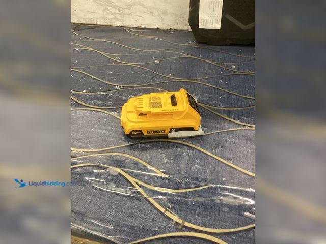 Lot 49-3539728 - DeWalt Lithium Ion Battery 2AH Item is used