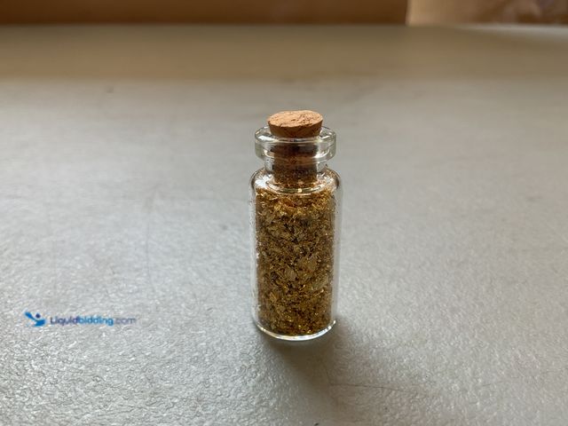 Lot 49-5341536 - RARE 1 INCH GLASS VILE OF PURE 24K GOLD FLAKES